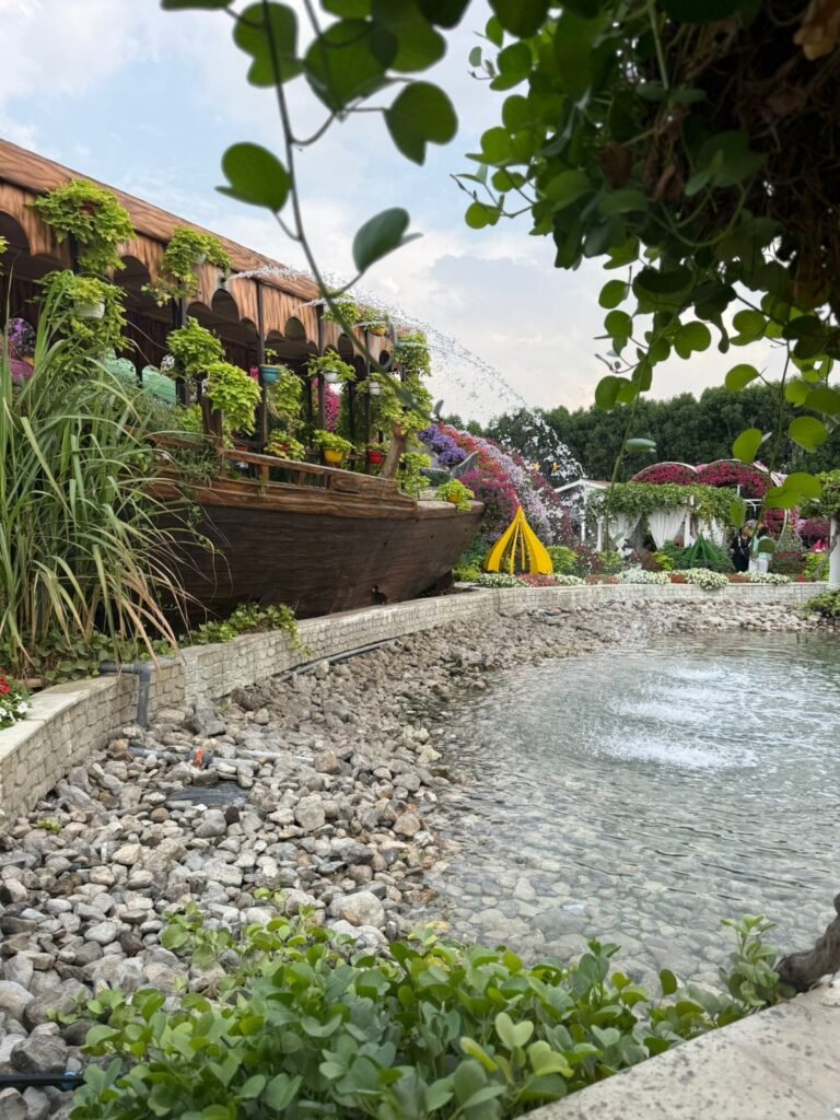 Commercial landscaping in Abu Dhabi with neatly trimmed hedges, trees, and modern landscape layout.