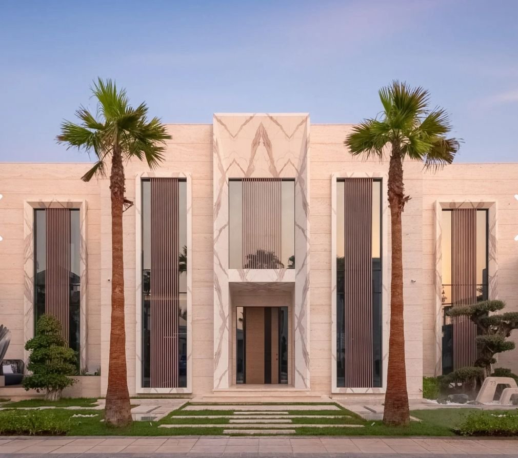 Date palm tree installation project in Sharjah residential landscape